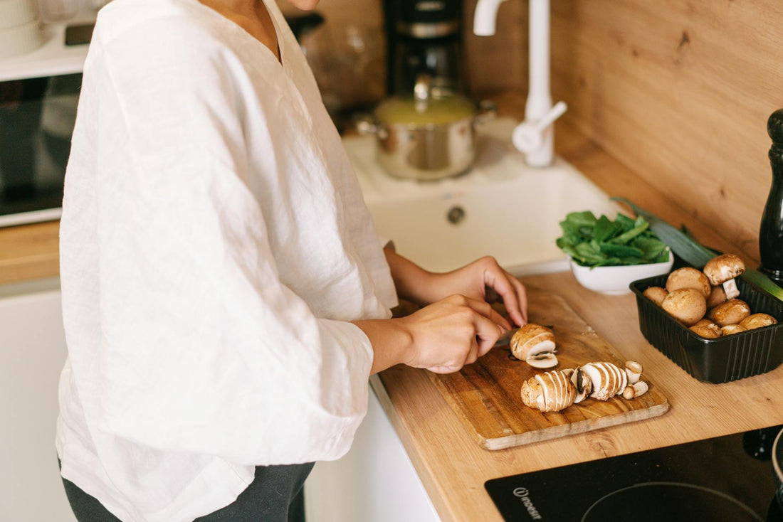 How do you clean a wooden cutting board hygienically.