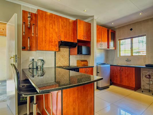 How to clean laminate kitchen cupboards assuming they're textured.