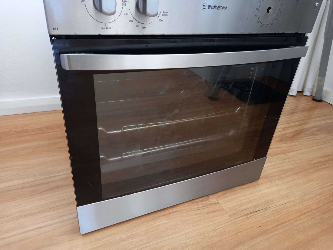 Cleaning oven glass surfaces after they're grease-splattered.