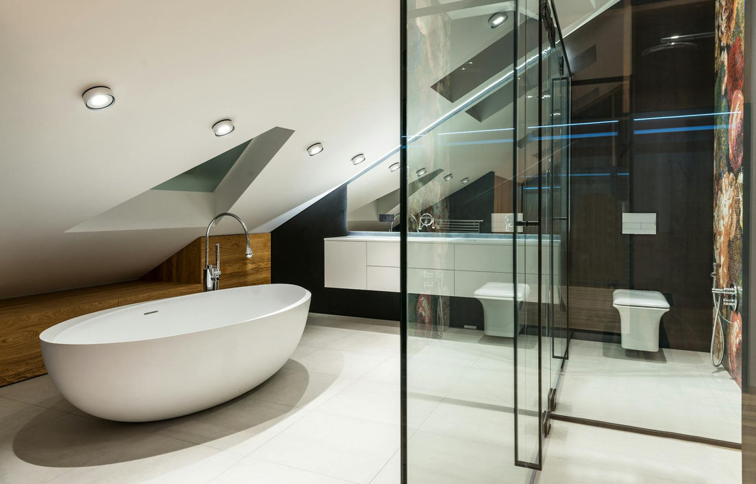 Clean, crystal-clear shower screen in a stylish modern bathroom.