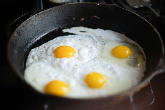 How to clean cast iron pan seasoning layers after undergoing egg roasts.